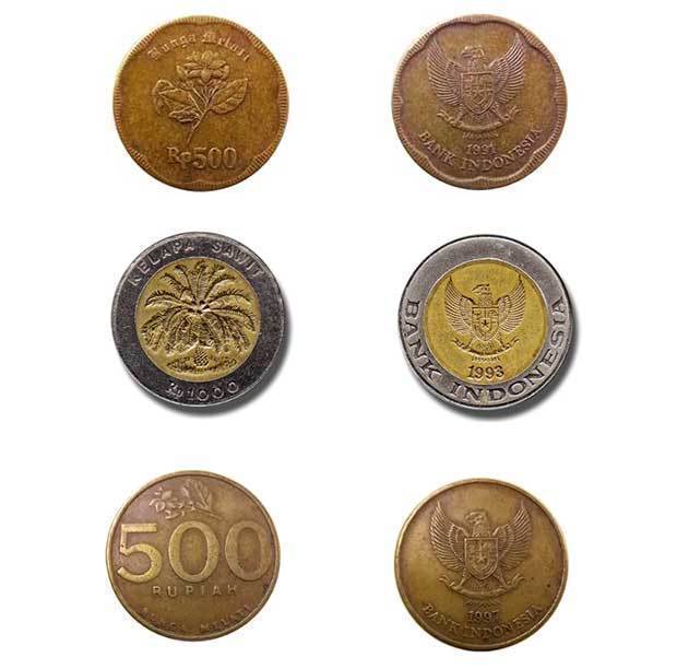 中央銀行が１日から回収する旧500ルピア硬貨２種と、旧1,000ルピア硬貨（中銀提供）