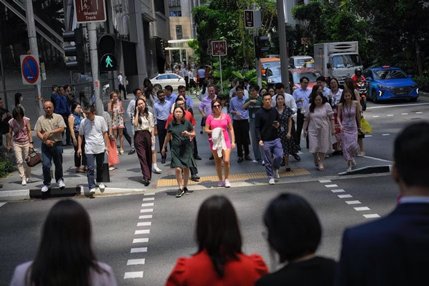シンガポールで勤務方針に関する議論が活性化している（PHOTO: ST FILE）