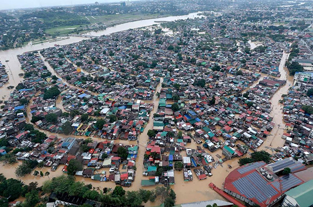 台風22号で発生した洪水で被災した住宅群（大統領府提供）