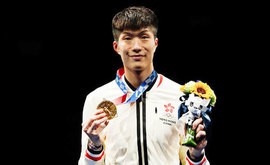 香港に25年ぶりの金メダルをもたらした張選手＝７月26日、東京（香港政府提供）